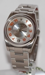 Rolex Silver Arabic Dial Watch 114200