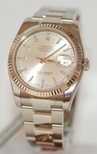 Rolex Silver Baton Dial Watch 116234